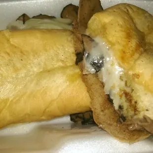 French dip. Look at the soggy bottom bun even before dipping and the thin line of beef inside.