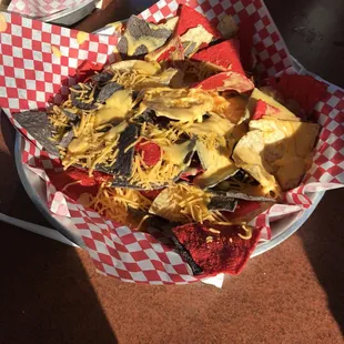 a basket of nachos and chips