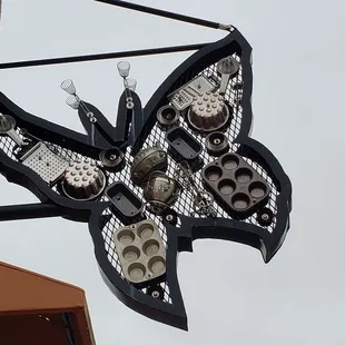 Cool exterior art above their awning (November 2021).