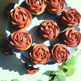 a plate of chocolate cupcakes