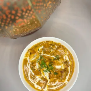 a bowl of soup on a table