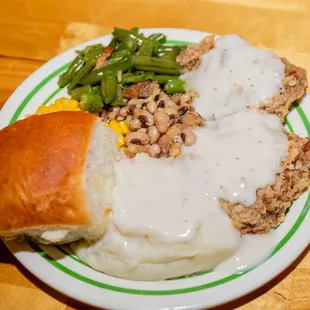 a plate of food on a wooden table