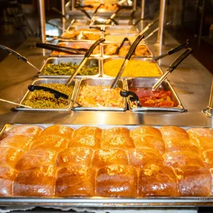 a buffet with a variety of food items