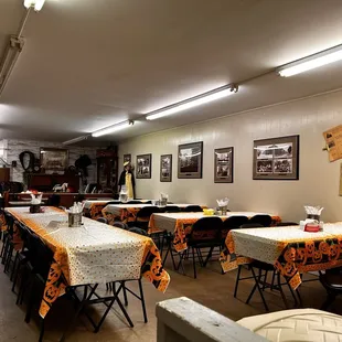 a dining room with tables and chairs