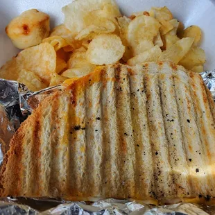 Grilled cheese paninibwith kettle chips 1/2 size $6.99