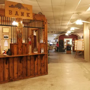 At entrance is the cashier.