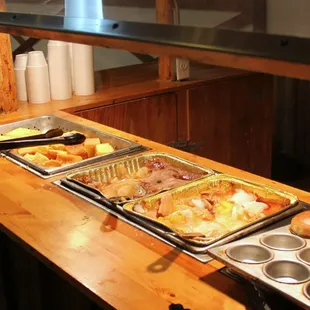 2 kinds of cobbler, hot rolls, cornbread.