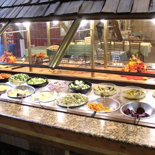 Salad bar (lettuce and soup are on ends).