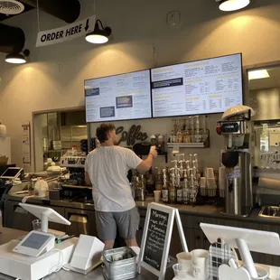 a man working behind the counter