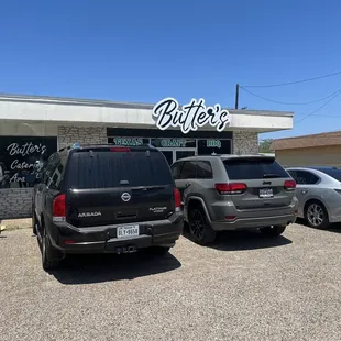 cars parked in front of the restaurant