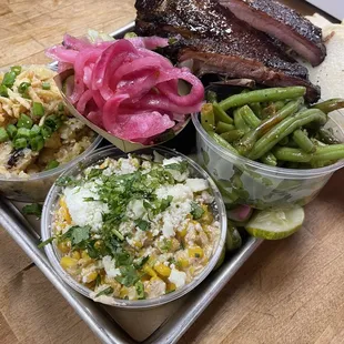 Hash brown, green beans, ribs, sausage, pickled onions and pickles