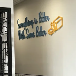 Cute sign near the bathrooms