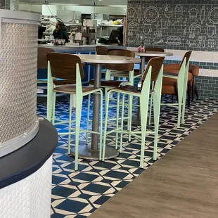 Interior high table seating, low comfy chairs and Diner seating near kitchen. Not shown: regular booth and table seating.