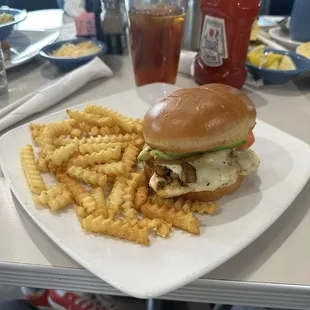 Chicken avocado sandwich with fries