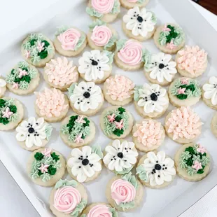 a box of decorated cookies