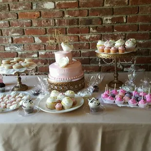 Pink &amp; gold baby shower dessert table.