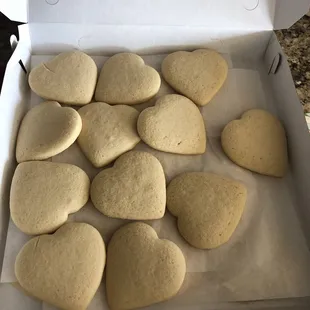 Two dozen heart cookies to decorate on Valentine's Day.