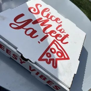 a pizza box on a table