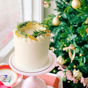 a white cake with pineapple decoration