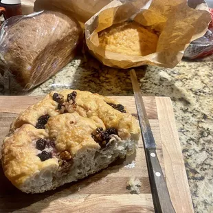 Walnut blackberry honey and salt focaccia on the board.