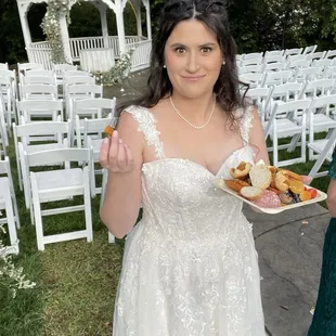 The bride enjoying her apps between photos!