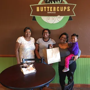 three women and a baby