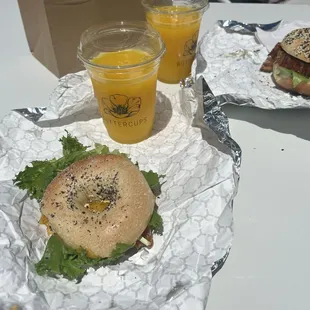 Orange juice and dream loaf bagel sandwich