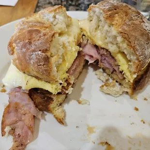 This is a Biscuit/ham/egg/cheese sandwich.