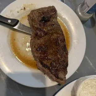 Over cooked, well done and ordered medium