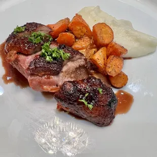 Duck, mashed potatoes and curry carrots