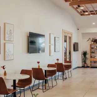 tables and chairs in a coffee shop