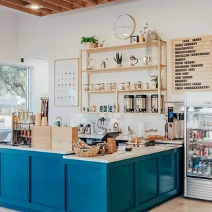 a coffee shop with a blue counter