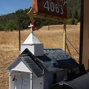 Butterfly Creek Mailbox across the road from the turn for the winery.