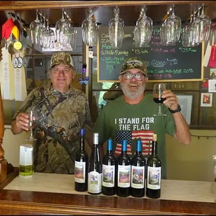 Michael and I toast to Bob and his amazing wine with a happy "Cheers!" as Bob takes our photo as we stand behind his bar.