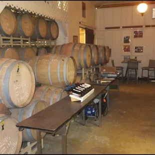 Just outside the tasting room, I gook a peek into the wine cellar, where wine is aging in oak barrels.