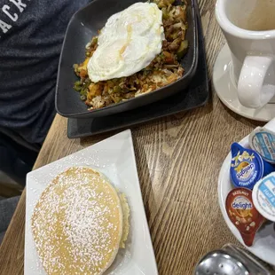 a pancake and a cup of coffee