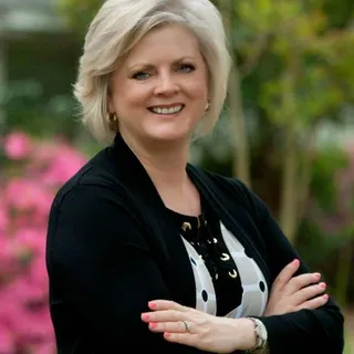 Joy C.
