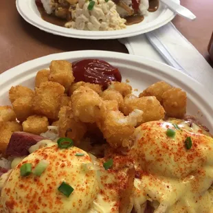 Fresh corn beef benny with crispy tater tots for me and kalua pig loco moco for Neil... so yummy!