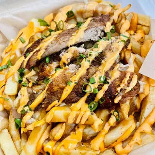 35. Poutine Kalua Pork Fries or Tater Tots