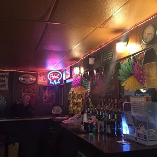 Enjoying a working man's drink at the Butt(on) Hole Bar