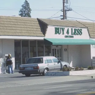 a car parked in front of a store