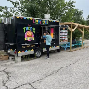 a taco truck selling tacos