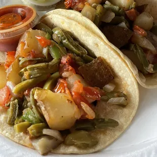 Vegetarian options ) potato,cactus,tomatoes,onions and jalapeño