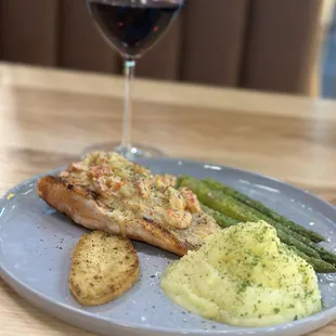 Salmon and crawfish with garlic mashed potatoes and asparagus