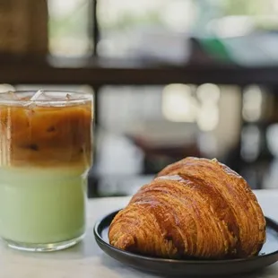a croissant and iced coffee