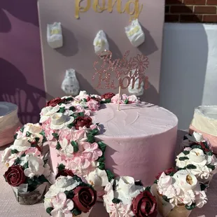 3 layer Vanilla and Chocolate cake with chocolate buttercream filling and vanilla buttercream florals.