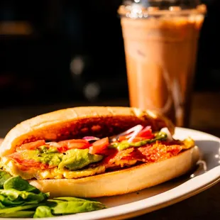 a sandwich and a drink on a table