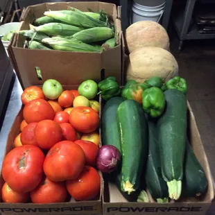 a variety of vegetables in boxes