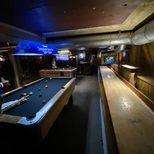 a pool table and arcade