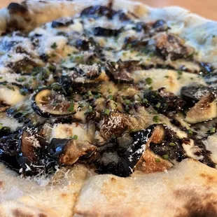 Fig, onion, cheese with balsamic glaze on the top.